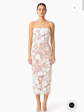 optics floral lace peplum dress Elliat optics floral lace peplum dress. Angled strapless neck. Lined. Comes with straps to change the look. Color blue. Size S available